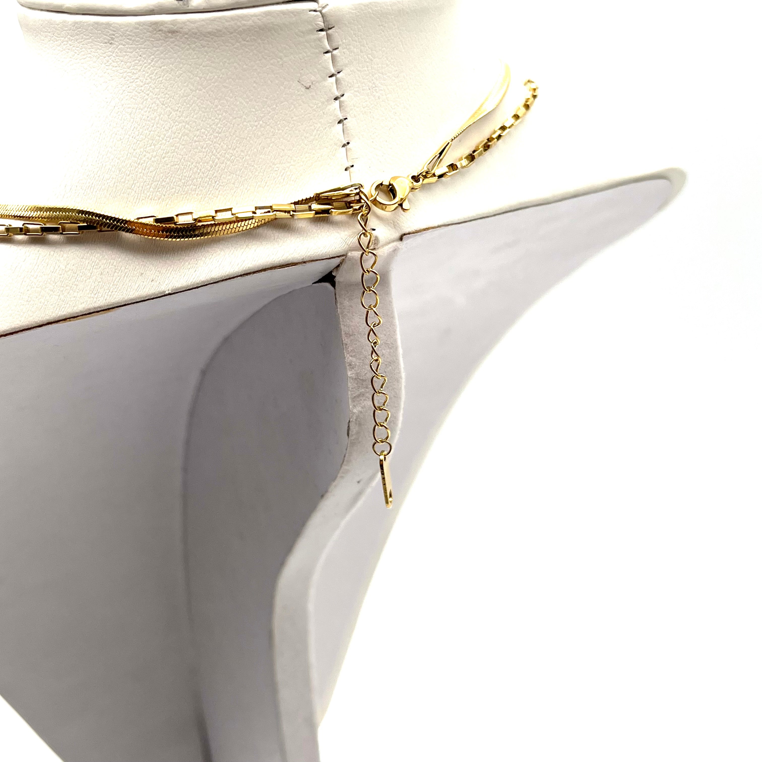 Collana in acciaio inox a doppio filo con croci pendenti – versione gold