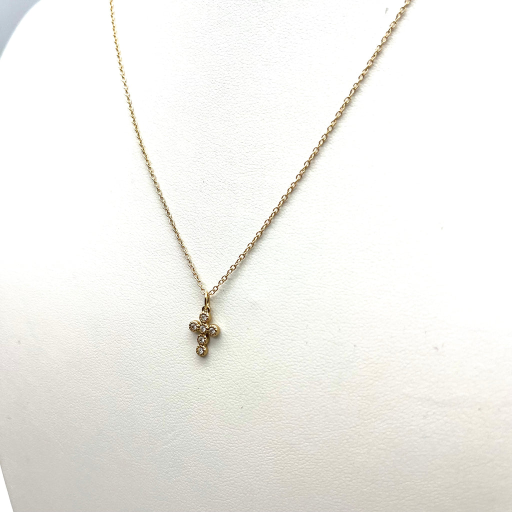 Collana mini croce dorata con zirconi