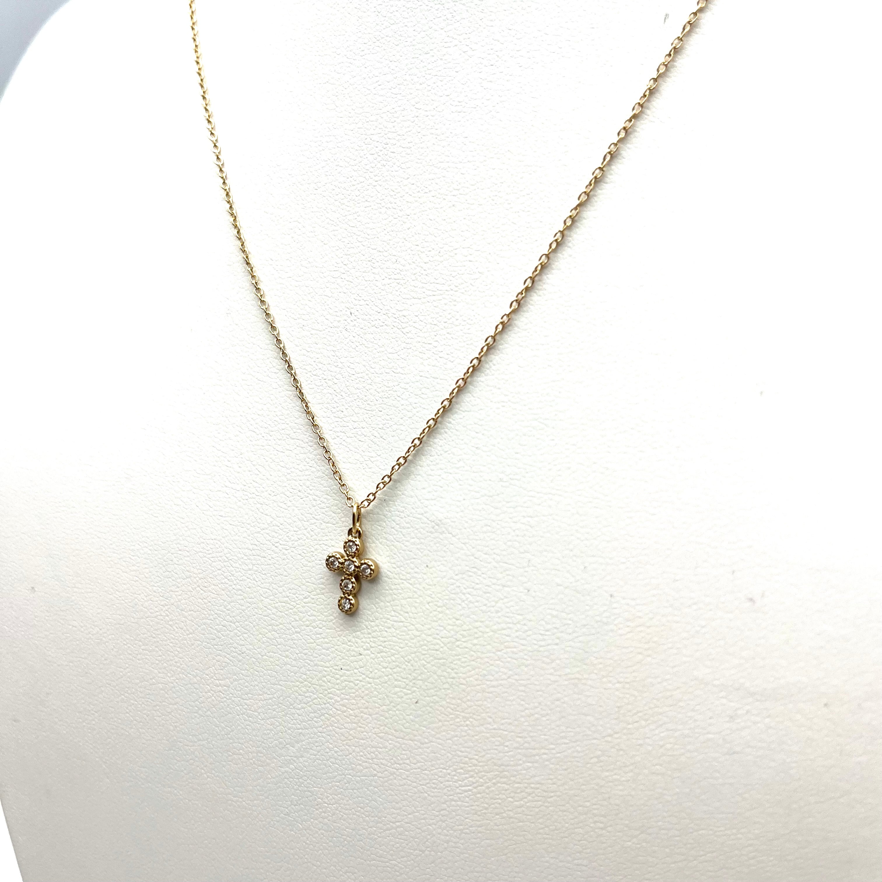 Collana mini croce dorata con zirconi