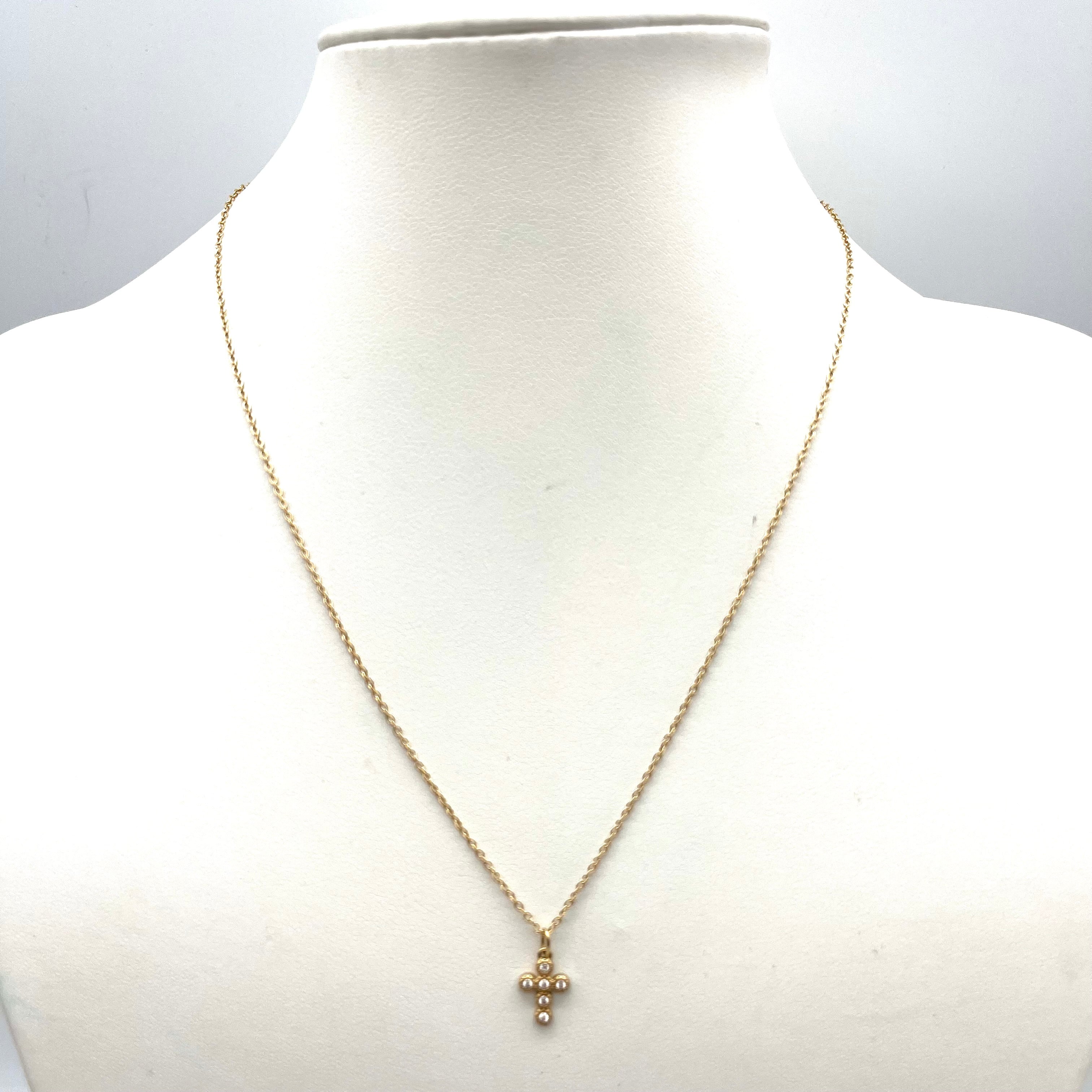 Collana mini croce dorata con zirconi