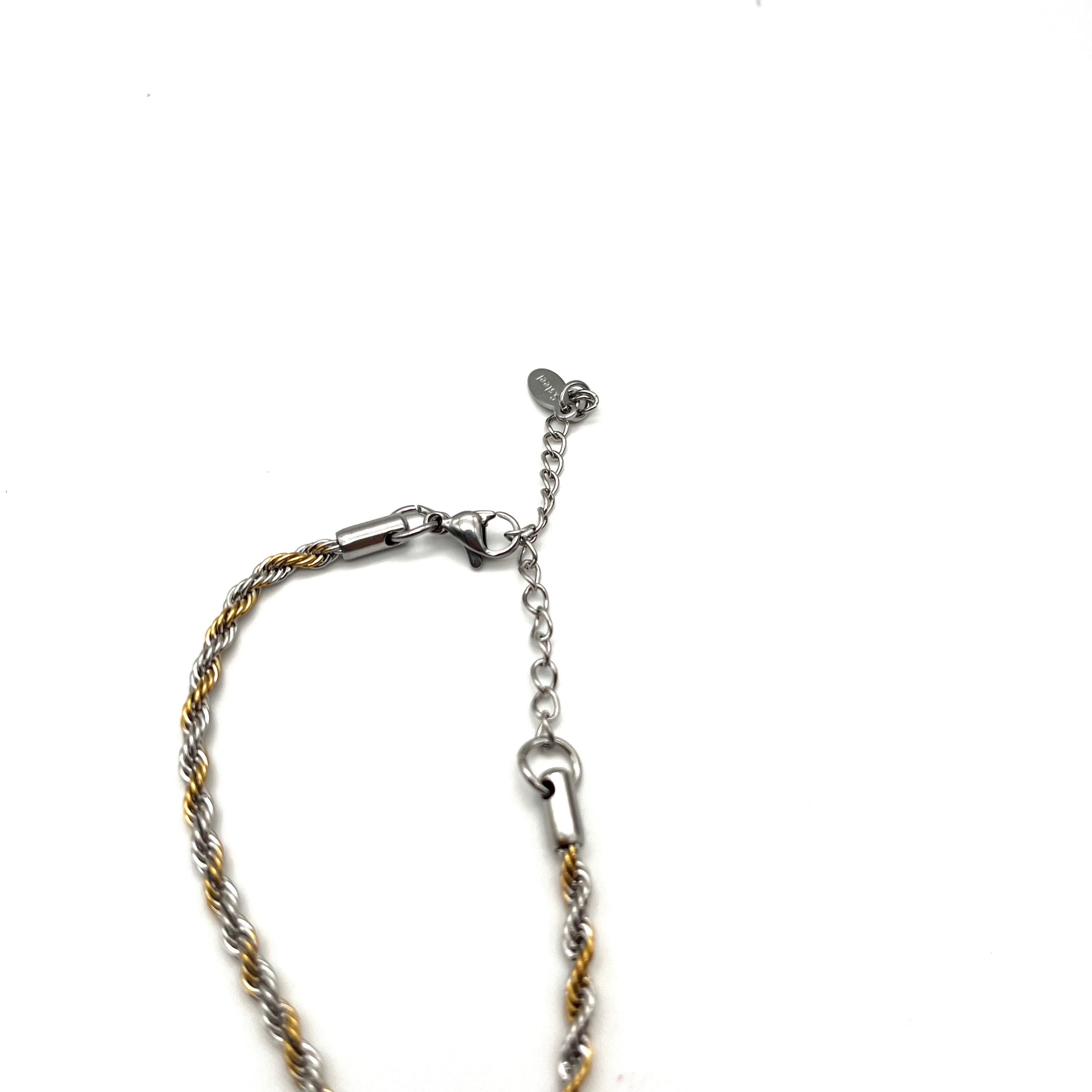 Bracciale treccia bicolore con medaglia di San Benedetto