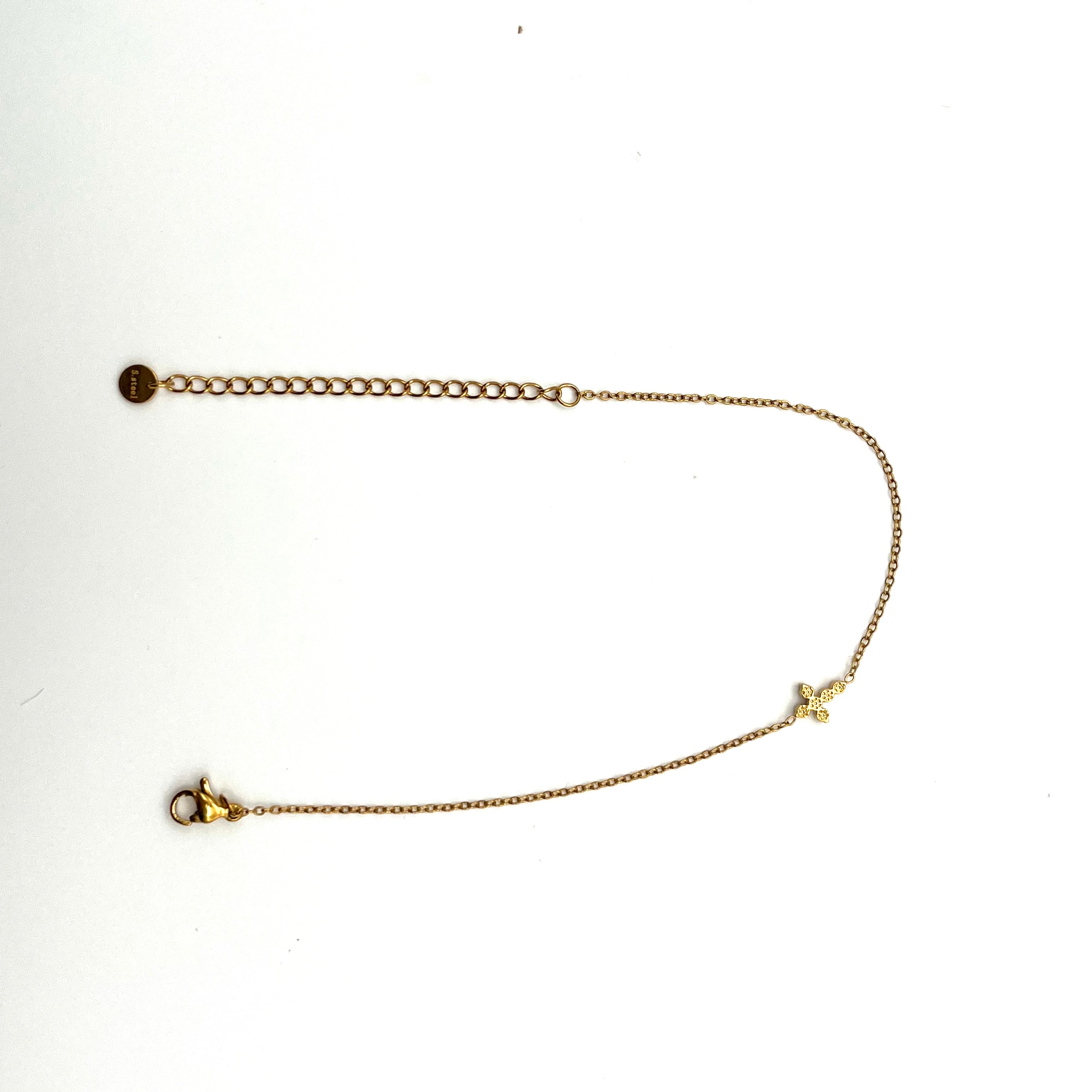 Bracciale in acciaio con croce e catenina regolabile