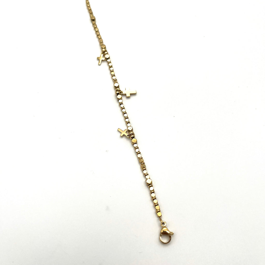 Bracciale croci dorato con mini charm