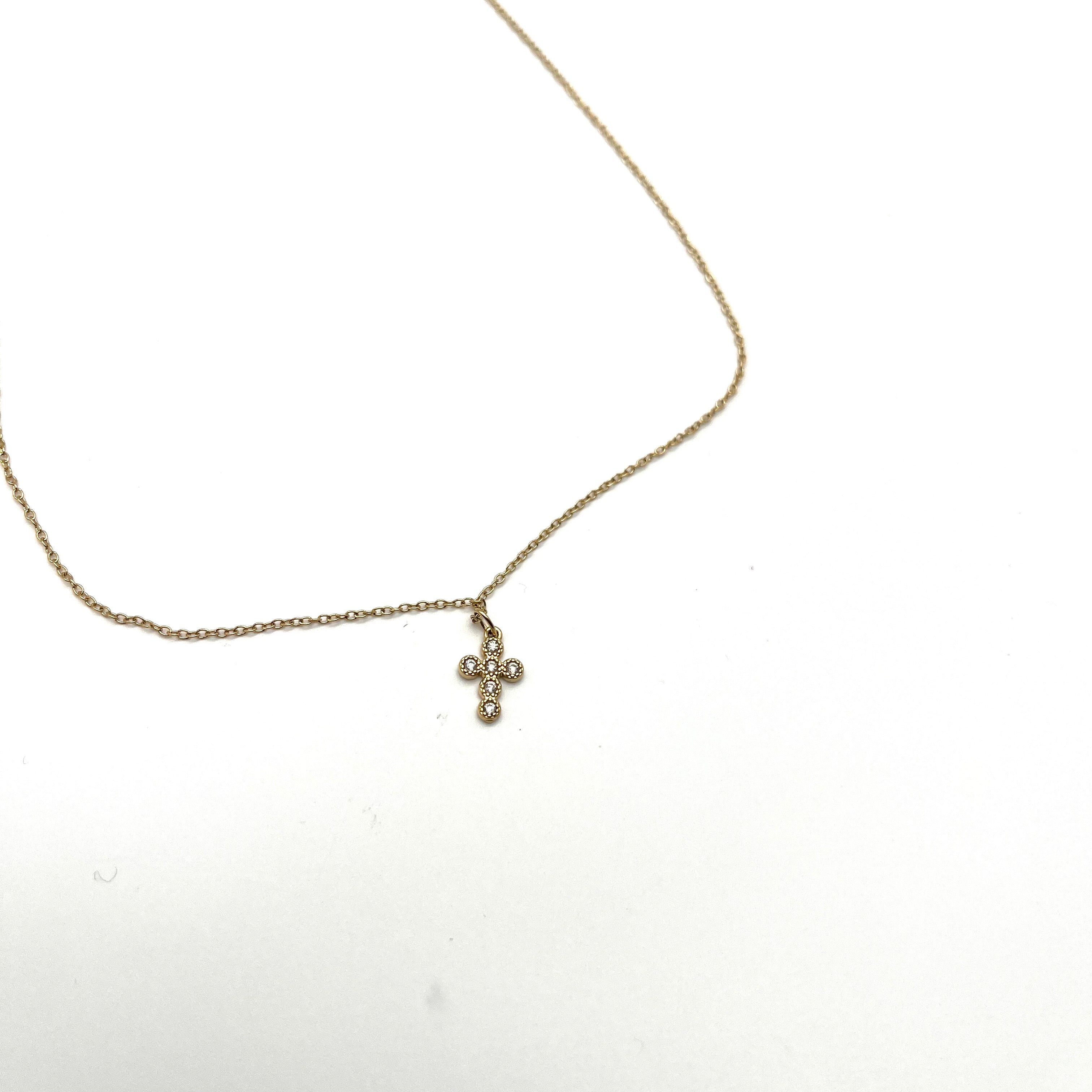 Collana mini croce dorata con zirconi